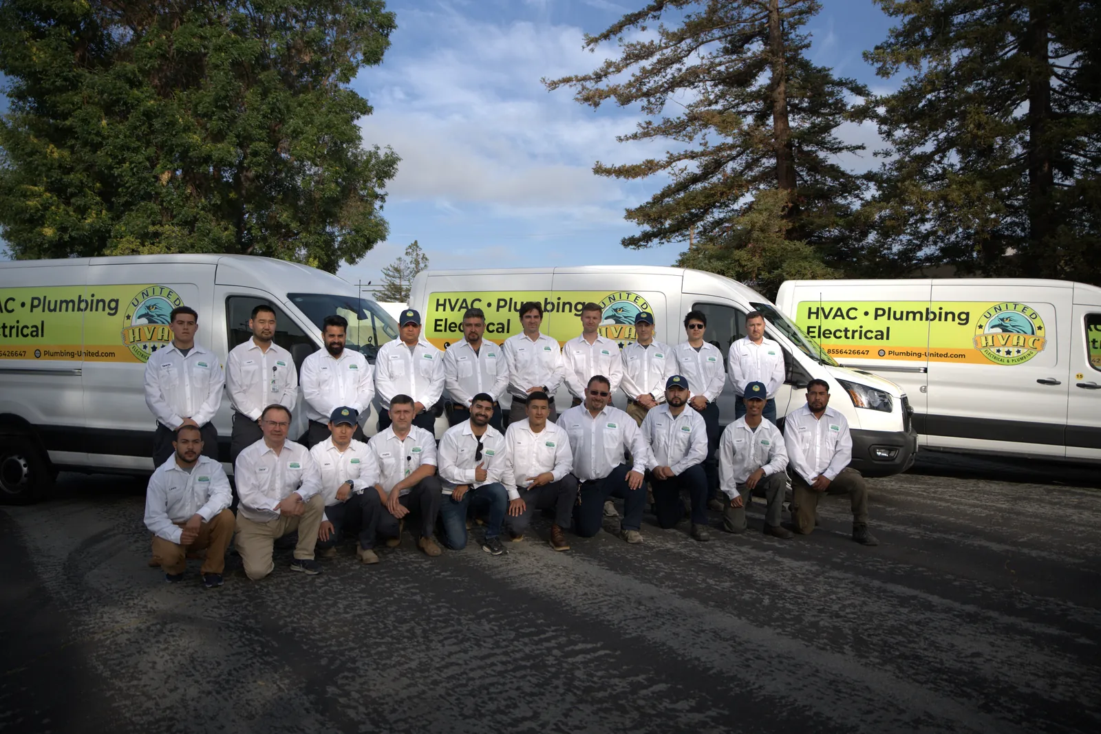 United Plumbing team with branded vans