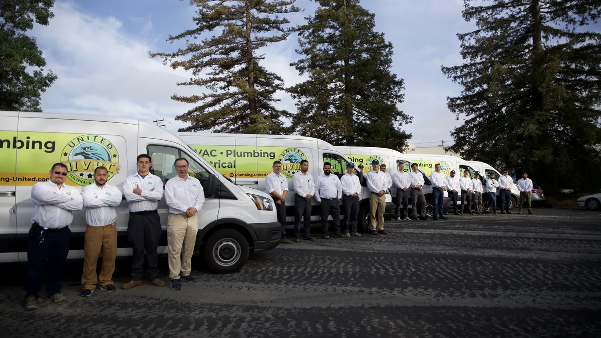 United Plumbing fleet and team lined up across the Bay Area