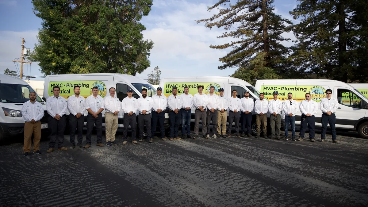 United Plumbing crew with branded vans in the Bay Area